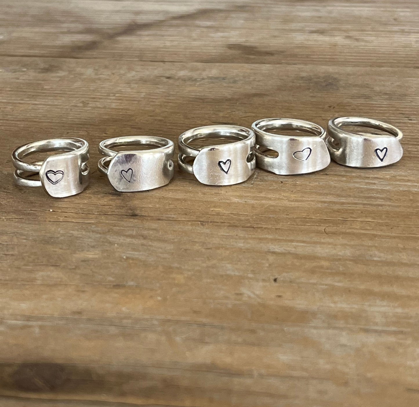 Double fork tine rings in various sizes showing handmade artisan craftsmanship of upcycled silverware jewelry