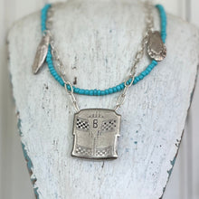 Mixed media double strand necklace with 1920s Giant Grip belt buckle