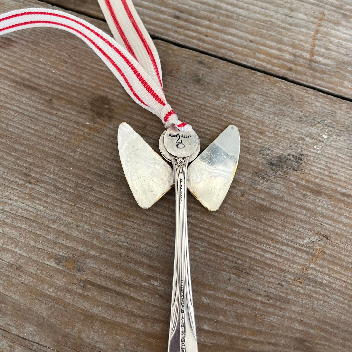 Close-up detail of Diana angel ornament crafted from vintage silverware pieces - handmade artisan Christmas ornament