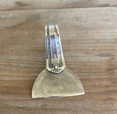 Florence pattern ergonomic spoon cheese knife showing heart handle from 1930 National Silver silverware