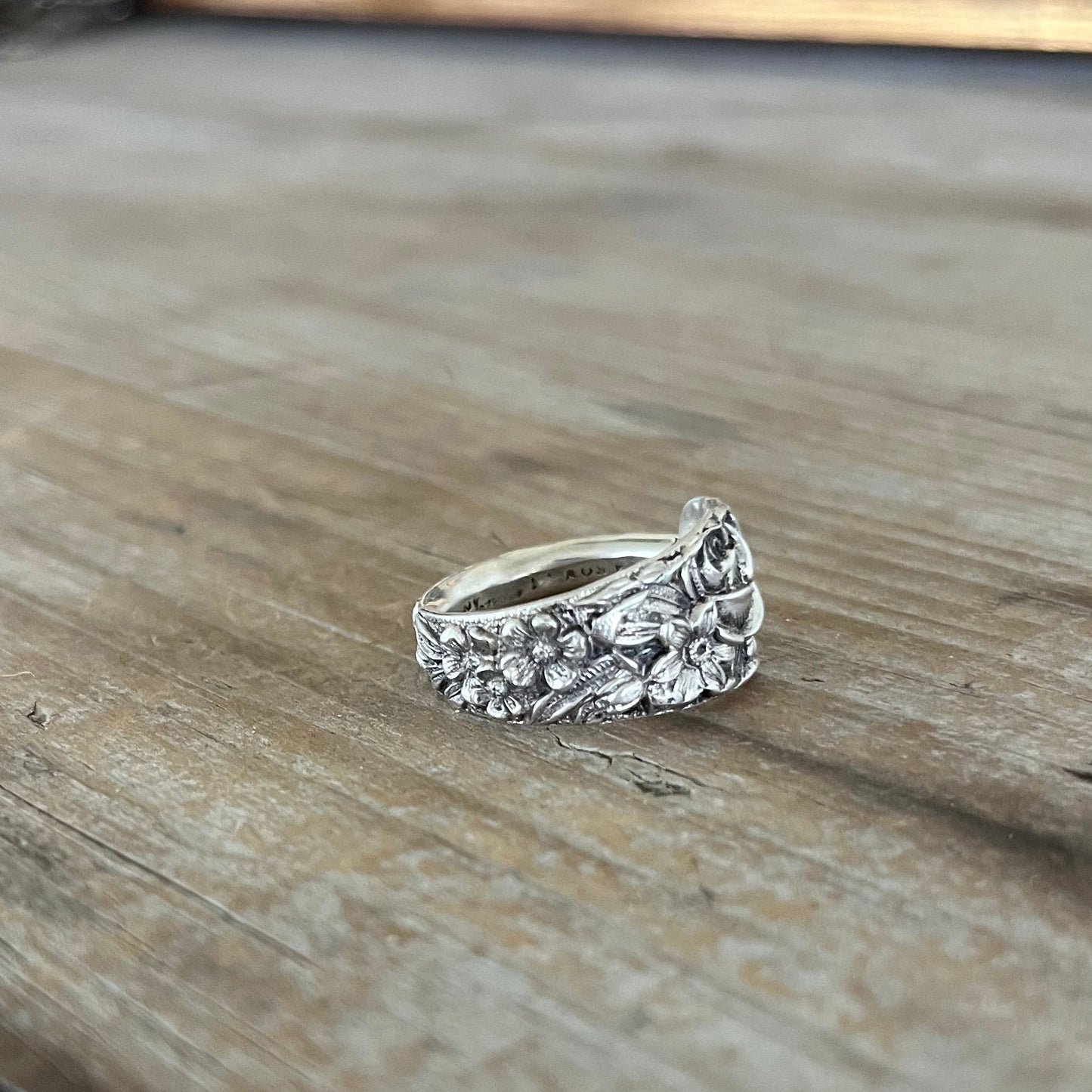 exquisite detail of Repoussé sterling silver spoon ring by Kirk & Son