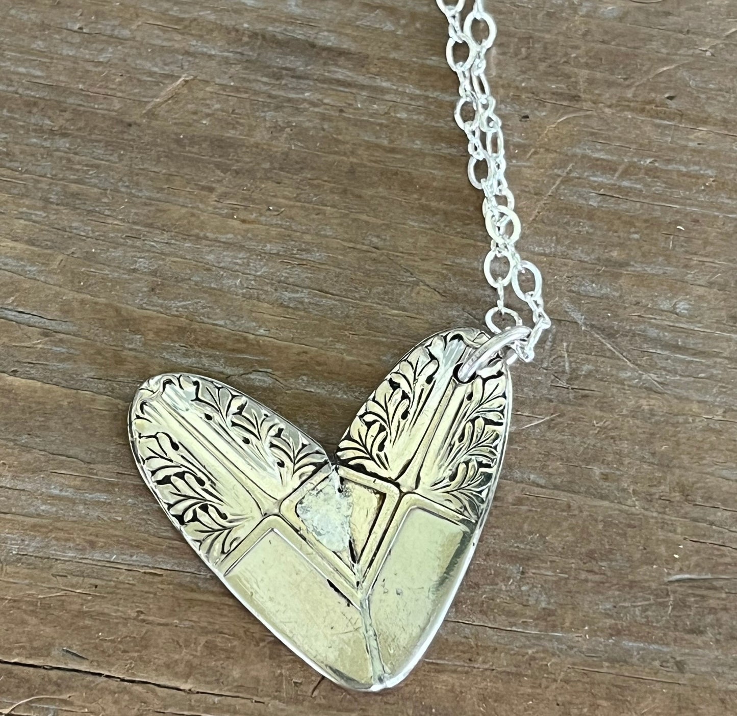 Close up of pendant on Cranford Sherwood silverplate heart necklace pendant - handcrafted from upcycled vintage silverware - Laughing Frog Studio
