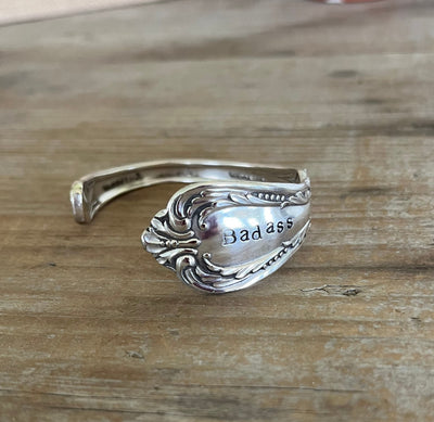 Detail view of hand-stamping on Chalice BADASS hand-stamped spoon cuff bracelet - upcycled vintage silverware - Laughing Frog Studio