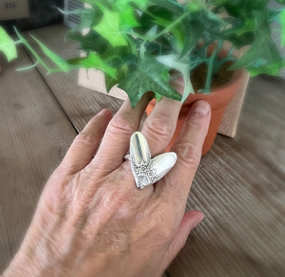 First Love heart ring shown on hand - romantic handcrafted upcycled silverware jewelry