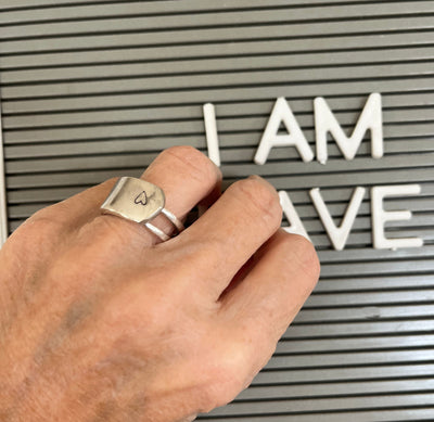 Double fork tine ring hand-stamped with a heart - size 10 - shown on hand - handcrafted from upcycled vintage silverware - Laughing Frog Studio
