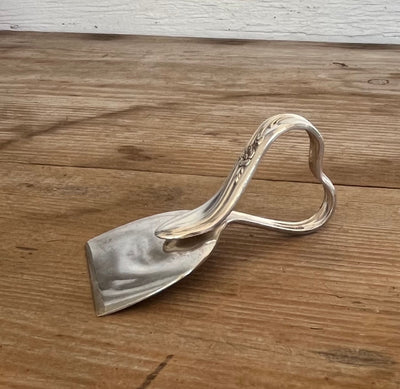 Side view of unique handle design of Holmes & Tuttle Meadow Flower Ergonomic heart handle spoon - upcycled vintage silverware - Laughing Frog Studio