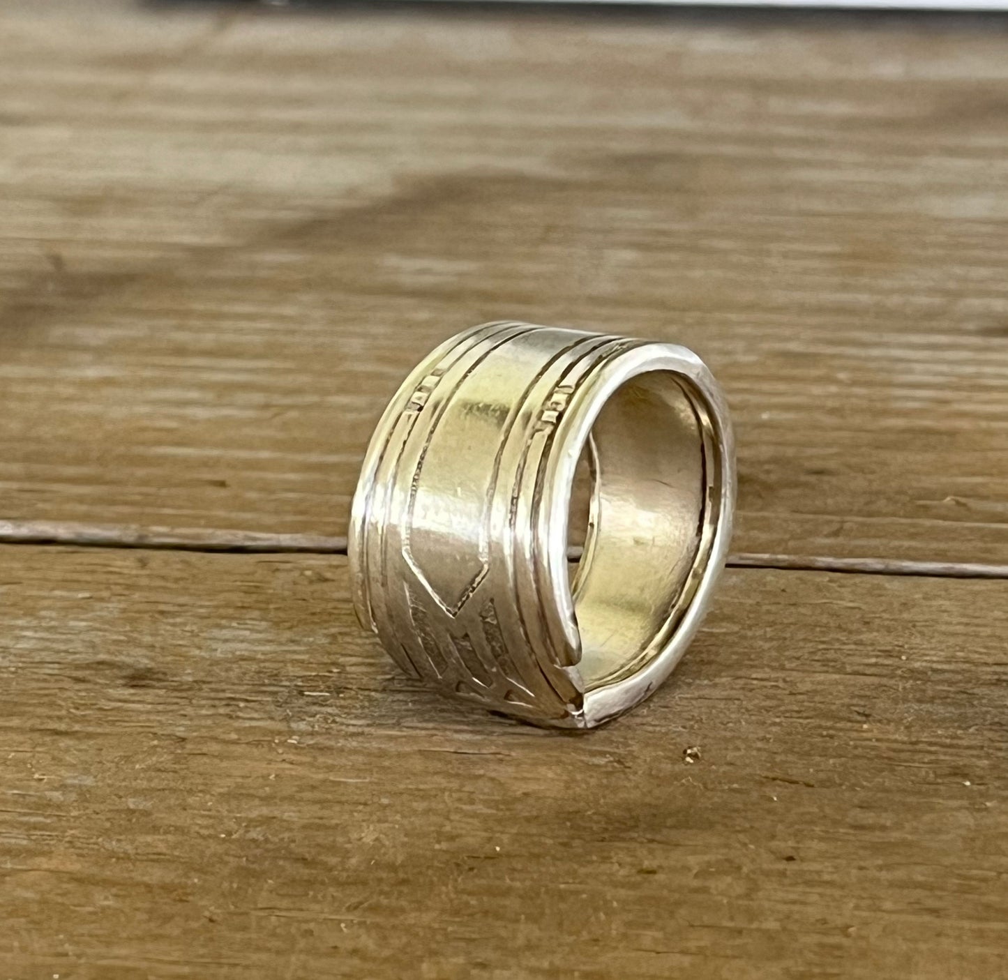 Side contour view of Art Deco geometric Oneida Friendship Medality spoon ring structure - handcrafted from upcycled vintage silverware - Laughing Frog Studio