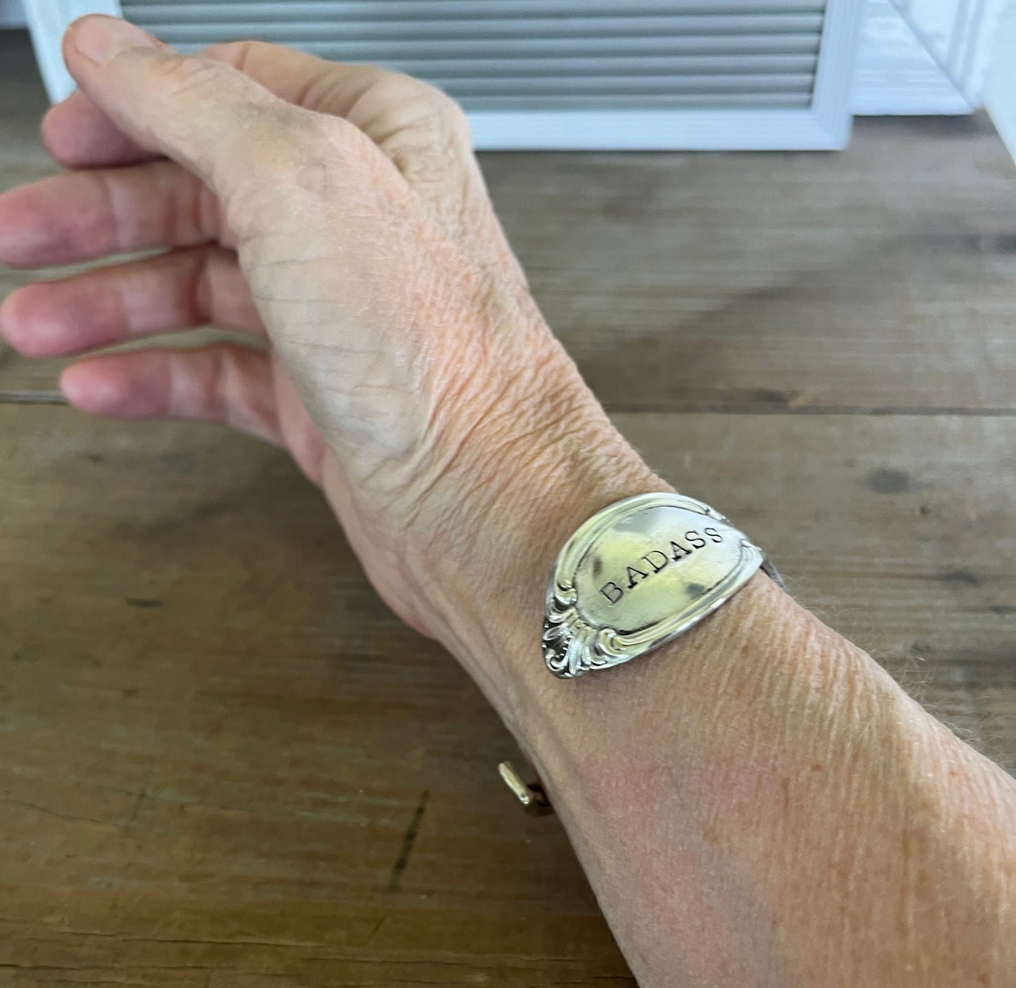 Alternate view of PRECIOUS MIRROR hand-stamped BADASS spoon cuff bracelet shown on wrist - handcrafted from upcycled vintage silverware - Laughing Frog Studio
