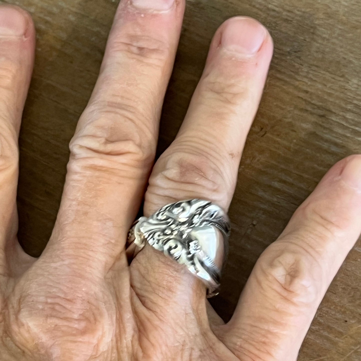 Alternate view of Towle King Richard sterling silver spoon ring on model's finger - handcrafted from upcycled vintage silverware - Laughing Frog Studio
