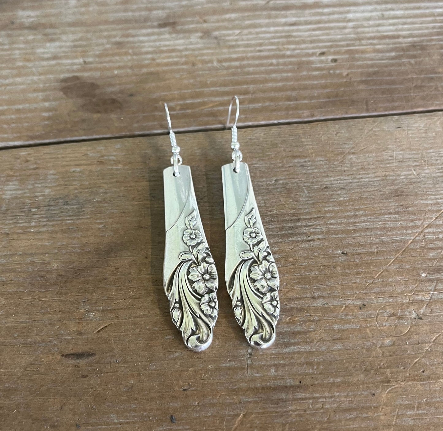 Detailed shot of Floral Oneida Evening Star teardrop spoon earrings - handcrafted from upcycled vintage silverware - Laughing Frog Studio