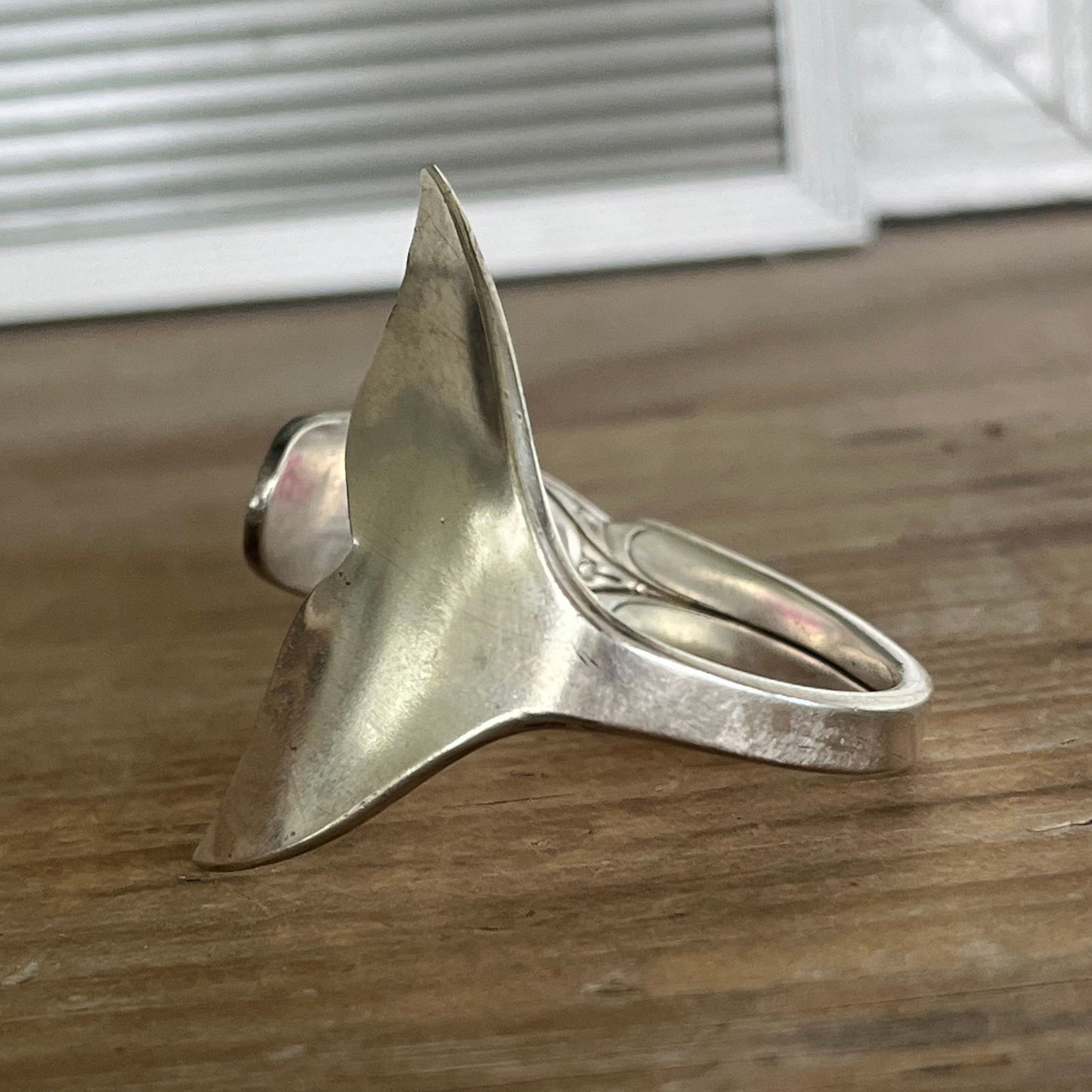 Detailed view of fin on Mermaid Soul spoon cuff bracelet - handcrafted from upcycled vintage silverware - Laughing Frog Studio