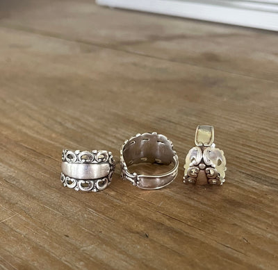 Trio of sterling silver spoon ring shandcrafted from vintage Swedish silverware with scrolled openwork design