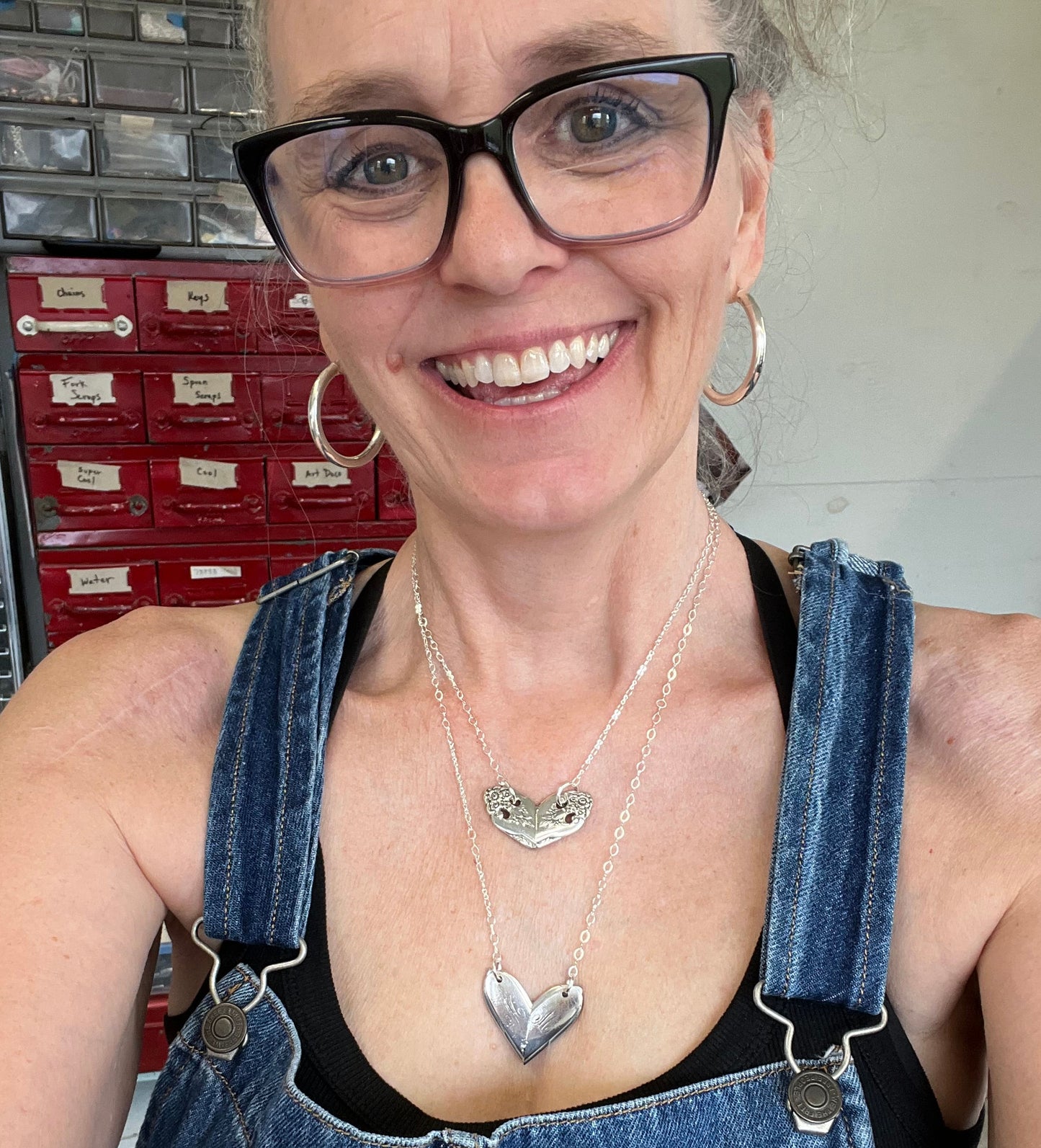 Lovely Lady heart necklace worn on model showing statement pendant and short chain, one-of-a-kind upcycled silverware jewelry