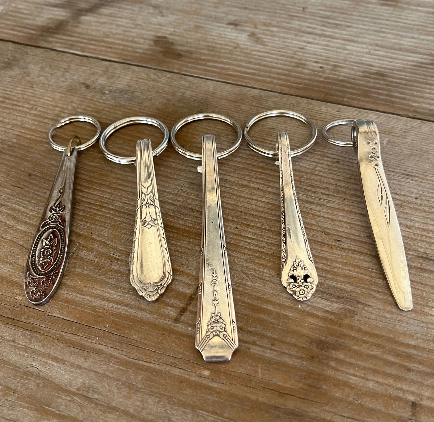 Upcycled vintage silverware spoon handle keychains alternate view showing handcrafted pattern details