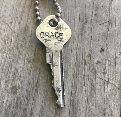Hand stamped giving Key Grace