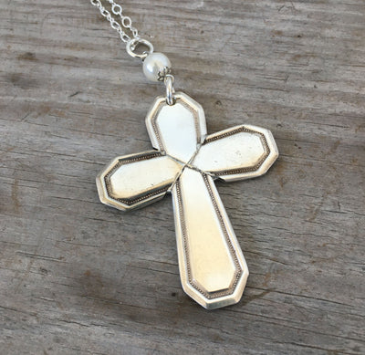 Detail of four-piece construction on Mayfair pattern cross pendant made from vintage William Rogers & Son spoon handles