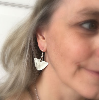 upcycled spoon earrings shown on model for drop length