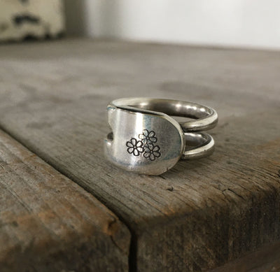 Double fork tine ring with trio of daisies made from upcycled vintage silverware