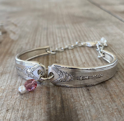 Close-up detail of Milady pattern spoon links with beads - handmade artisan silverware bracelet