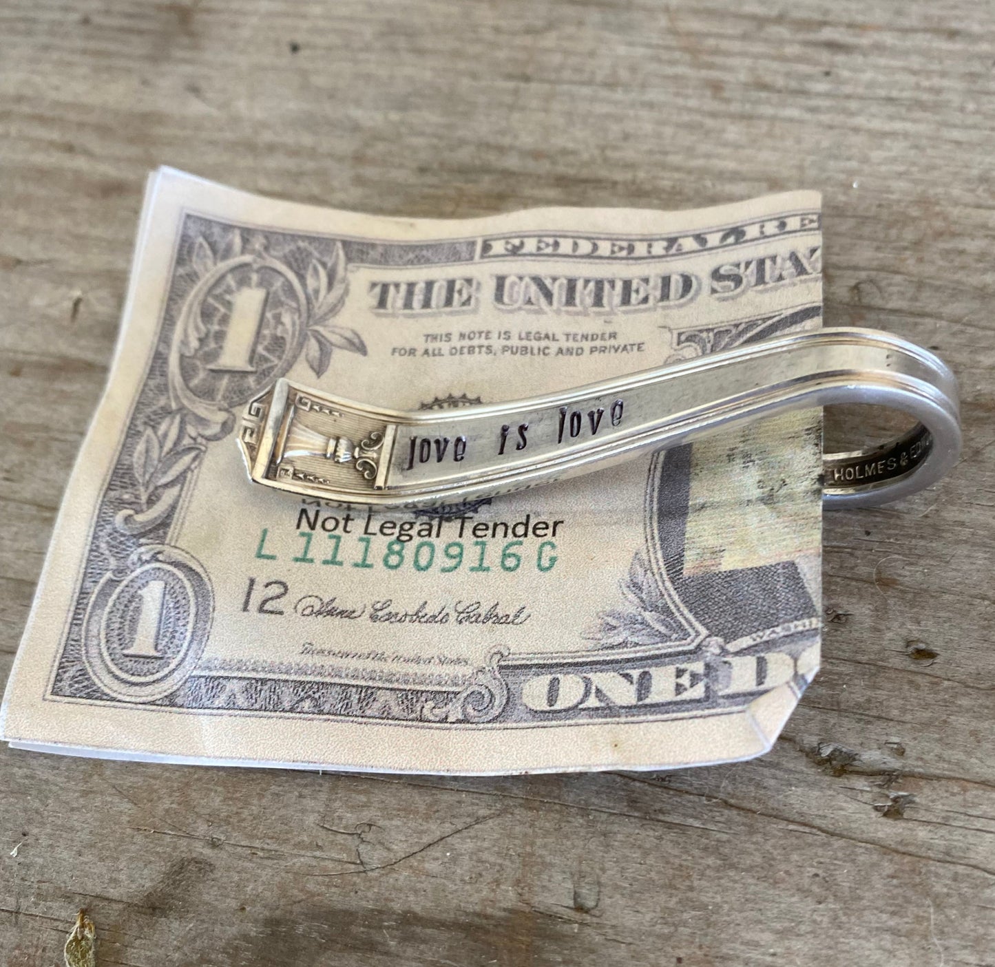 Side view of Century pattern spoon money clip displaying space to hold money and cards