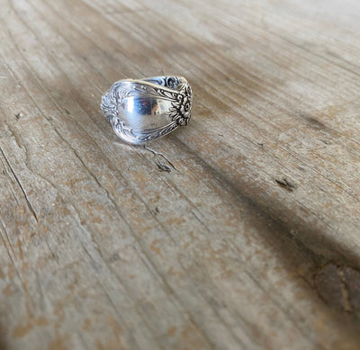 Shiny panel of Spoon ring hand made from vintage spoon handle