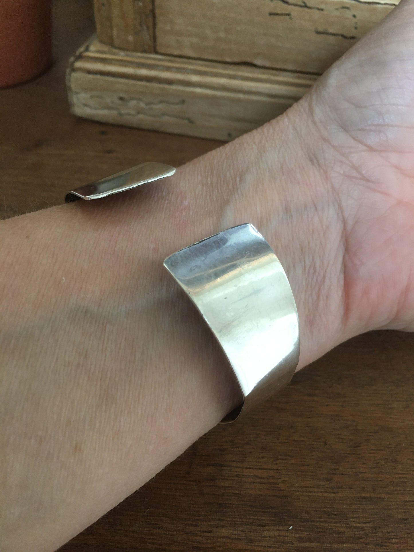 Sterling silver napkin ring cuff on wrist - Watrous AOK vintage silverware bracelet