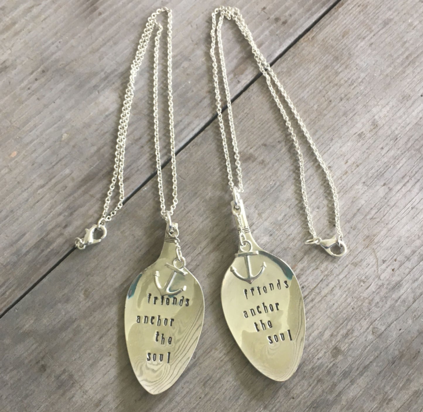 Multiple FRIENDS ANCHOR THE SOUL stamped spoon necklaces showing one-of-a-kind variations with anchor charms, layerable boho-gypsy style