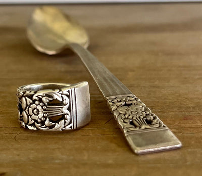 Vintage silverware spoon next to finished handcrafted spoon ring made from the same pattern - upcycled jewelry - Laughing Frog Studio