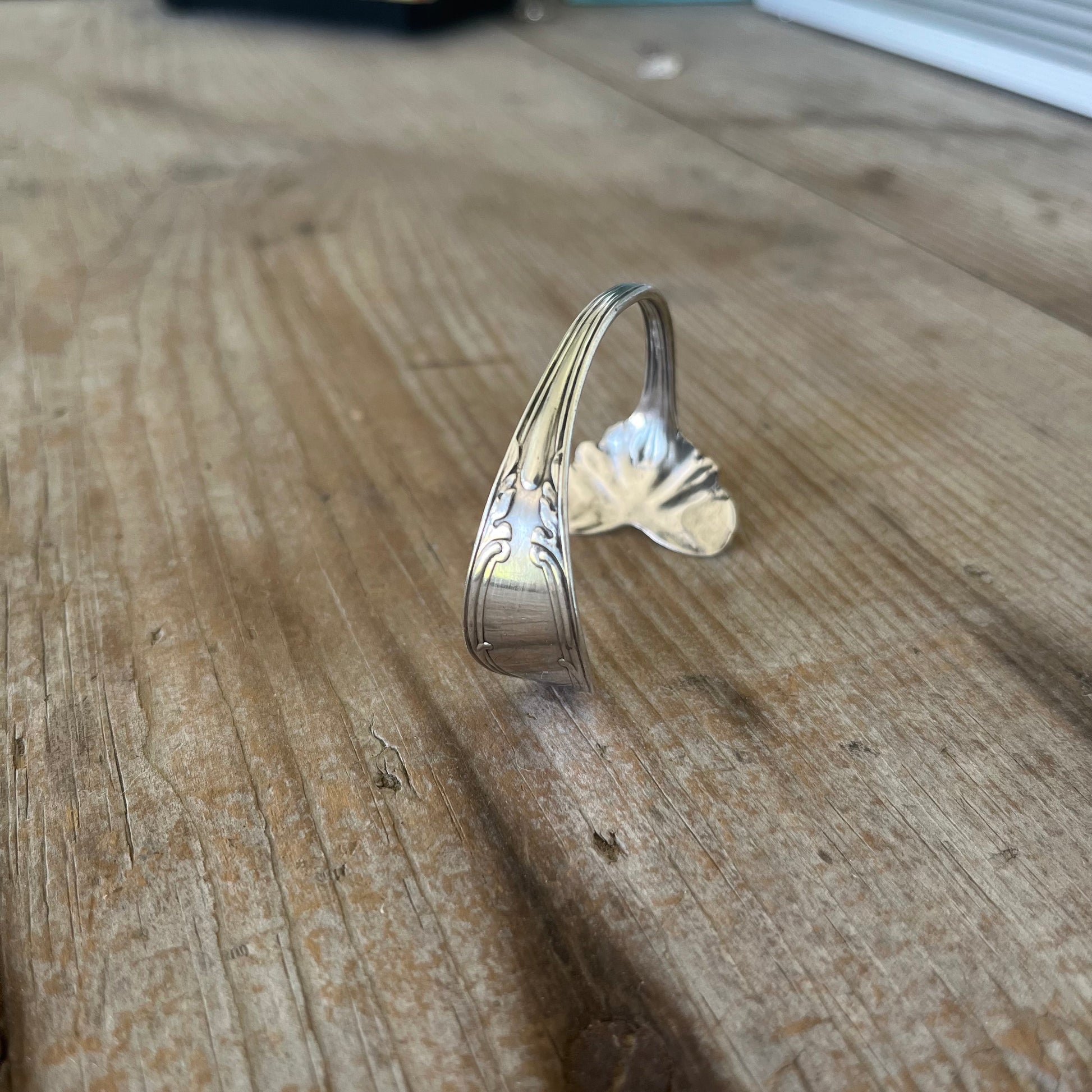 upcycled handmade sterling spoon cuff bracelet with heart shaped end