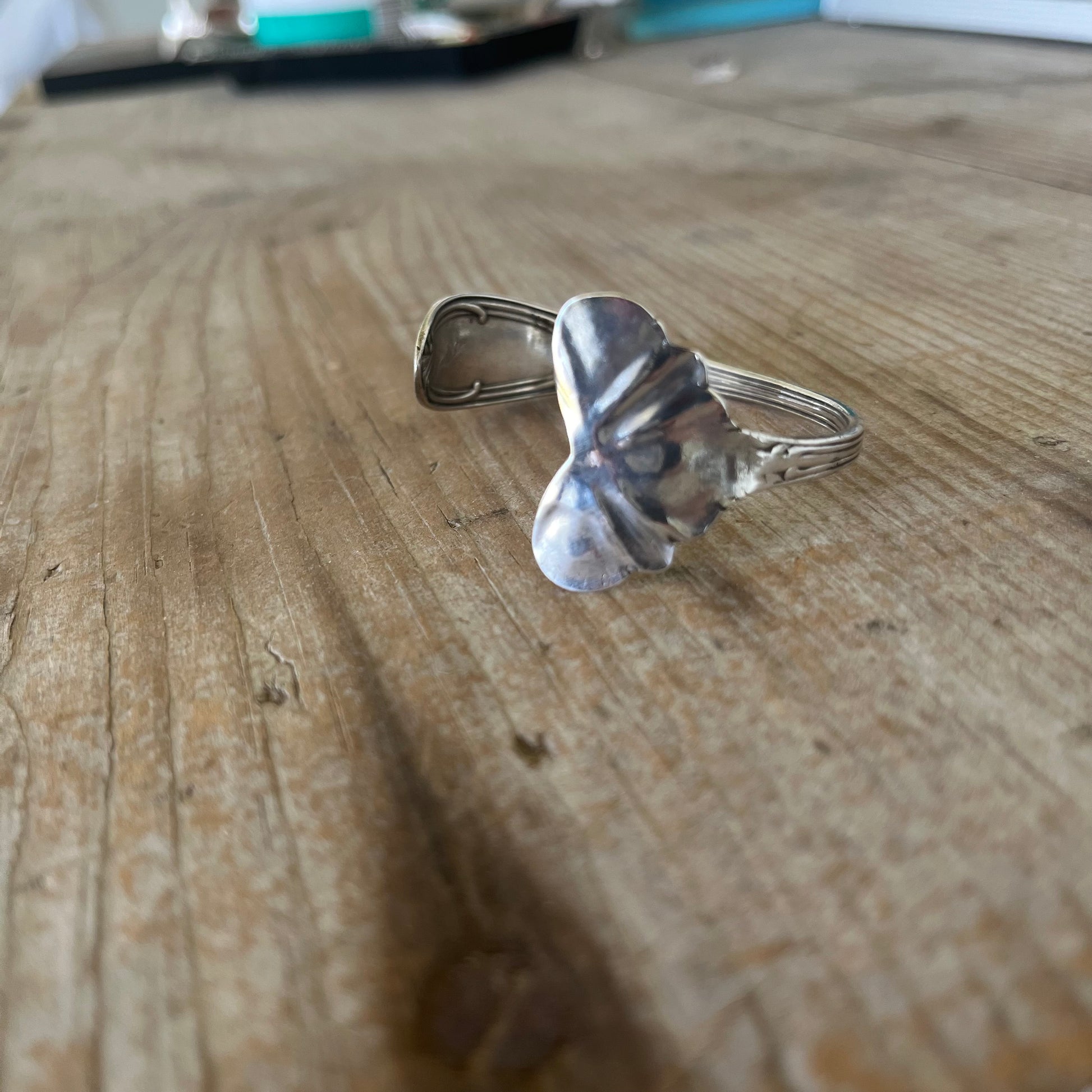 Decorative heart shaped end on upcycled vintage spoon cuff bracelet Tudor pattern - handcrafted artisan silverware jewelry 