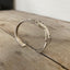 Side view of Monogrammed Spoon cuff bracelet - handcrafted from upcycled vintage silverware - Laughing Frog Studio