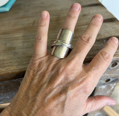 AFFECTION full spoon ring worn on finger displaying size and fit of upcycled baby spoon ring