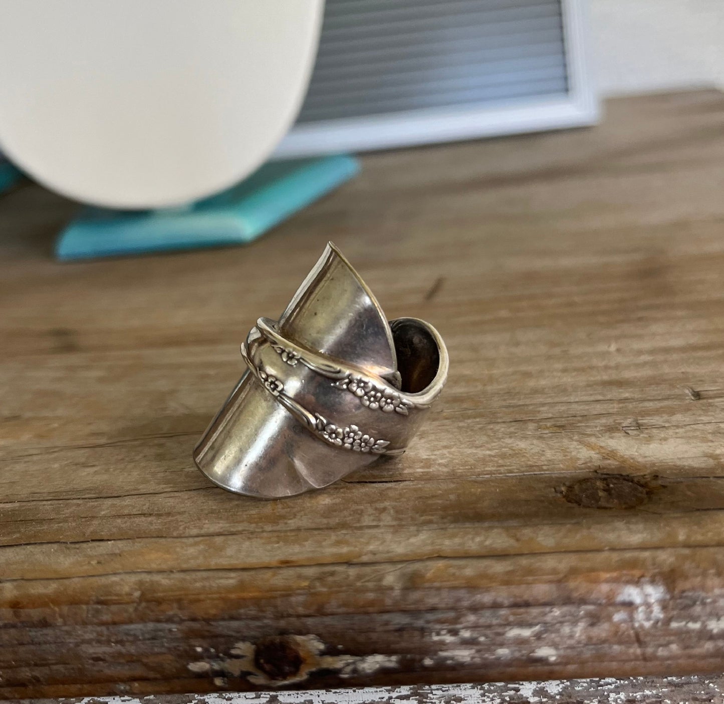 Side view of AFFECTION full spoon ring showing complete baby spoon detail