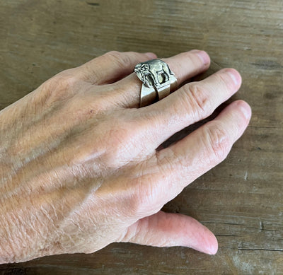 Sterling silver elephant demitasse spoon ring worn on model's hand - handcrafted from upcycled vintage silverware - Laughing Frog Studio