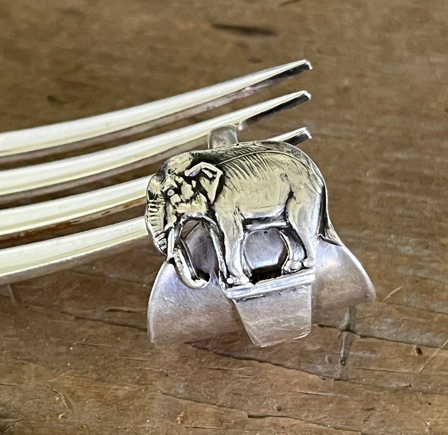 Detailed close up of elephant on sterling silver elephant demitasse spoon ring - handcrafted from upcycled vintage silverware - Laughing Frog Studio