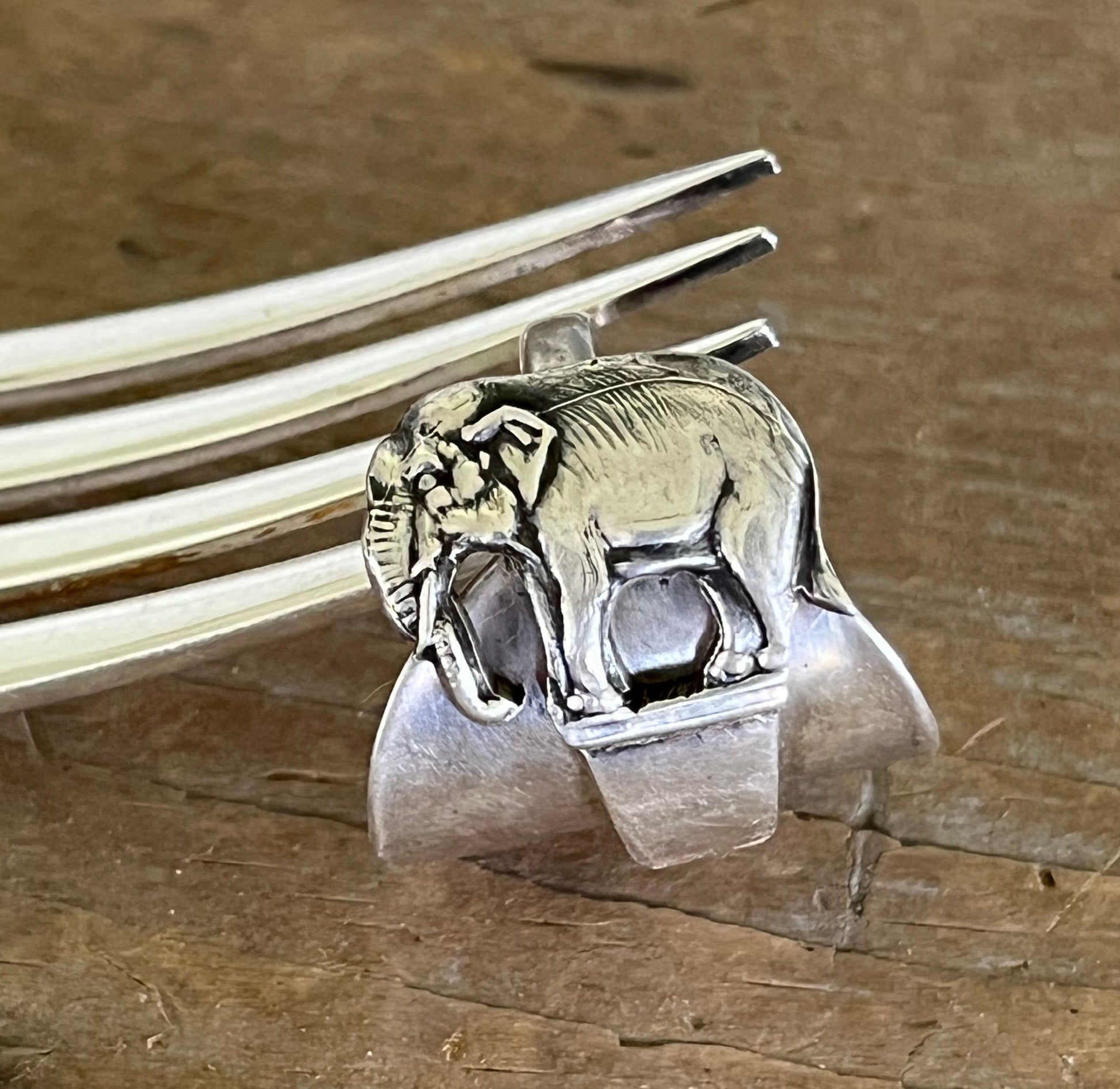 Detailed close up of elephant on sterling silver elephant demitasse spoon ring - handcrafted from upcycled vintage silverware - Laughing Frog Studio