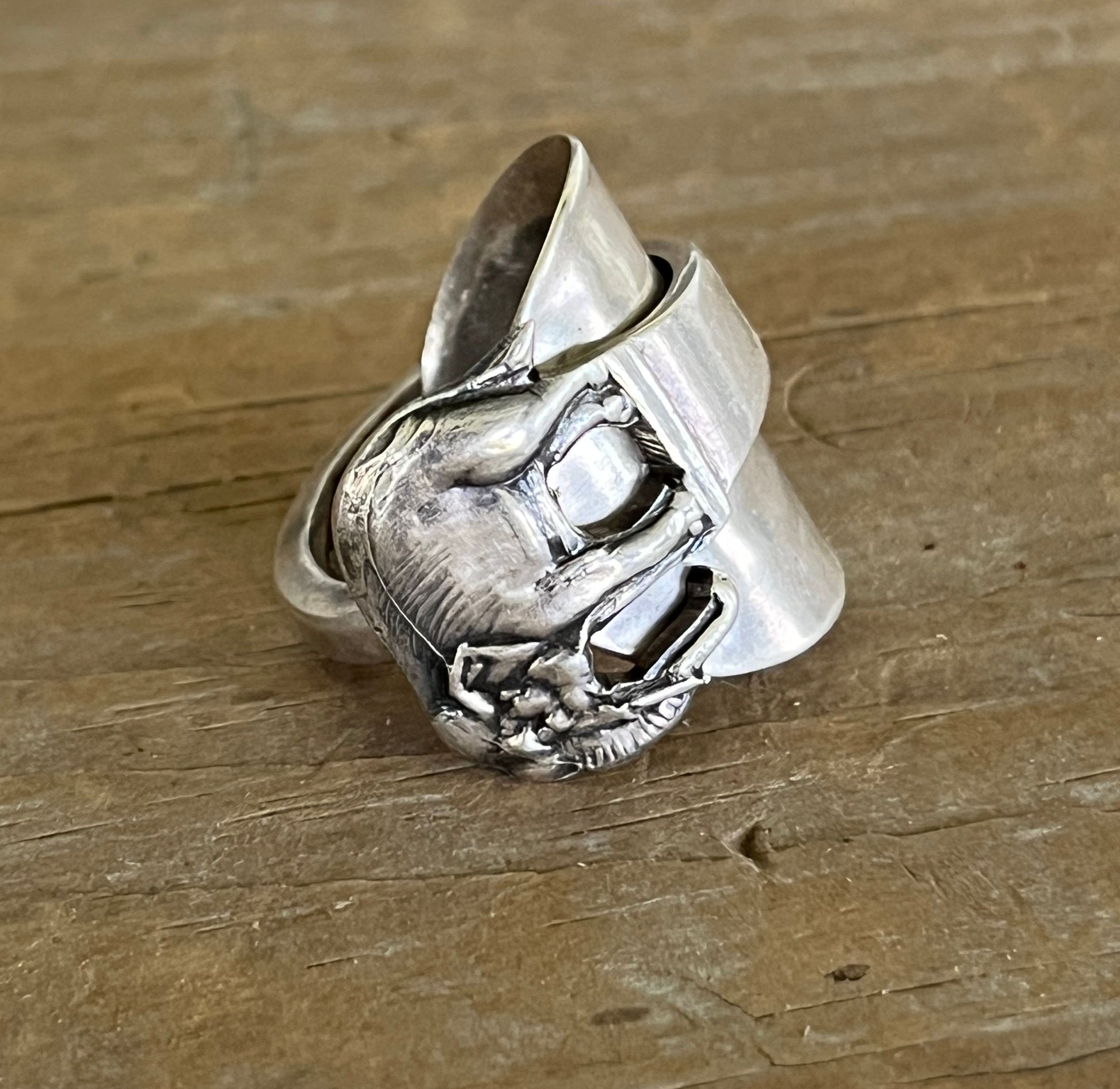 Close up side view of sterling silver elephant demitasse spoon ring - handcrafted from upcycled vintage silverware - Laughing Frog Studio