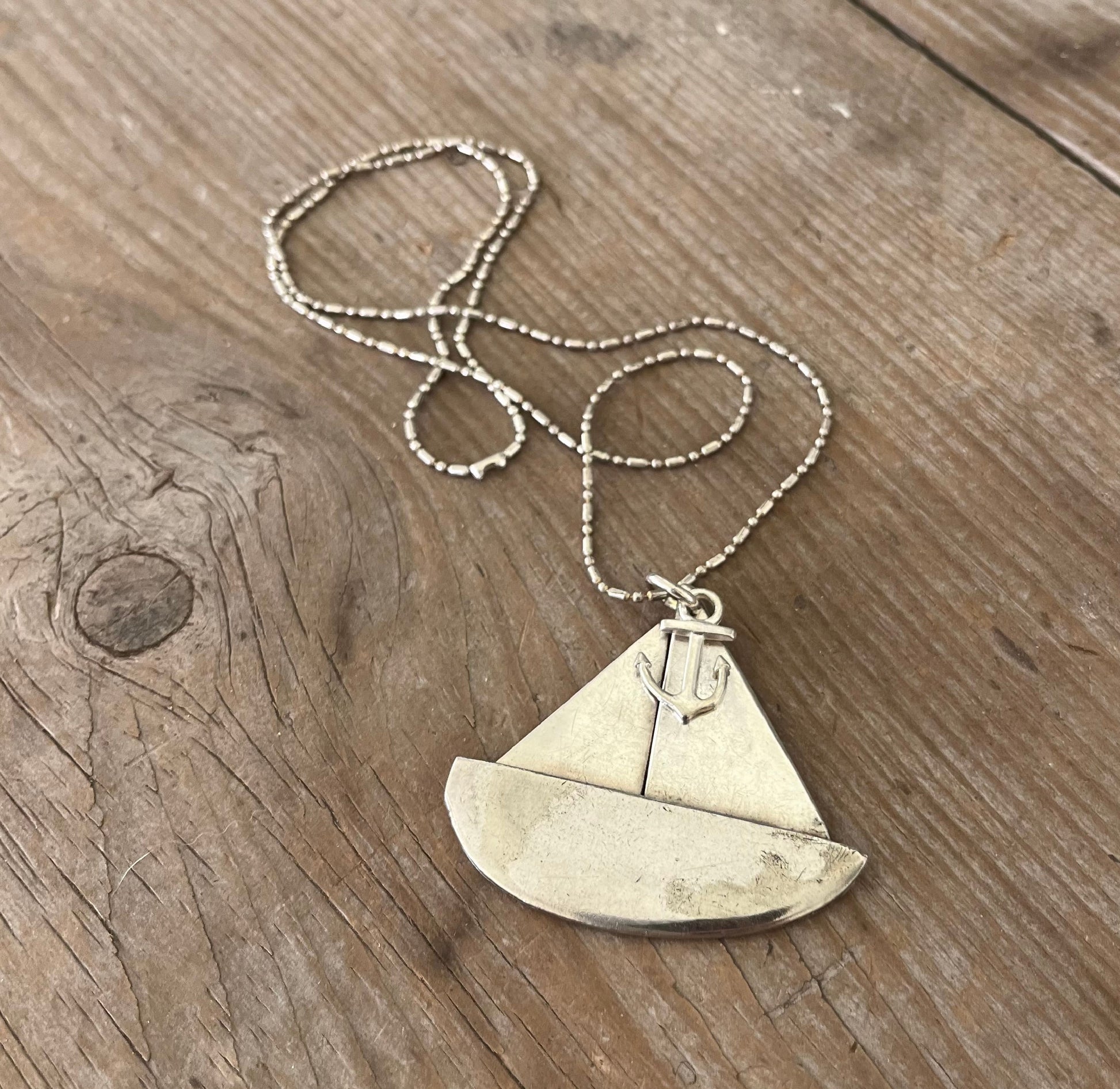 Handcrafted sailboat necklace made from upcycled vintage silverplate teaspoon bowls with anchor charm, one-of-a-kind nautical jewelry 