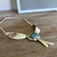 Side view of Artisan Native Wings statement necklace - one-of-a-kind upcycled silverware gift
