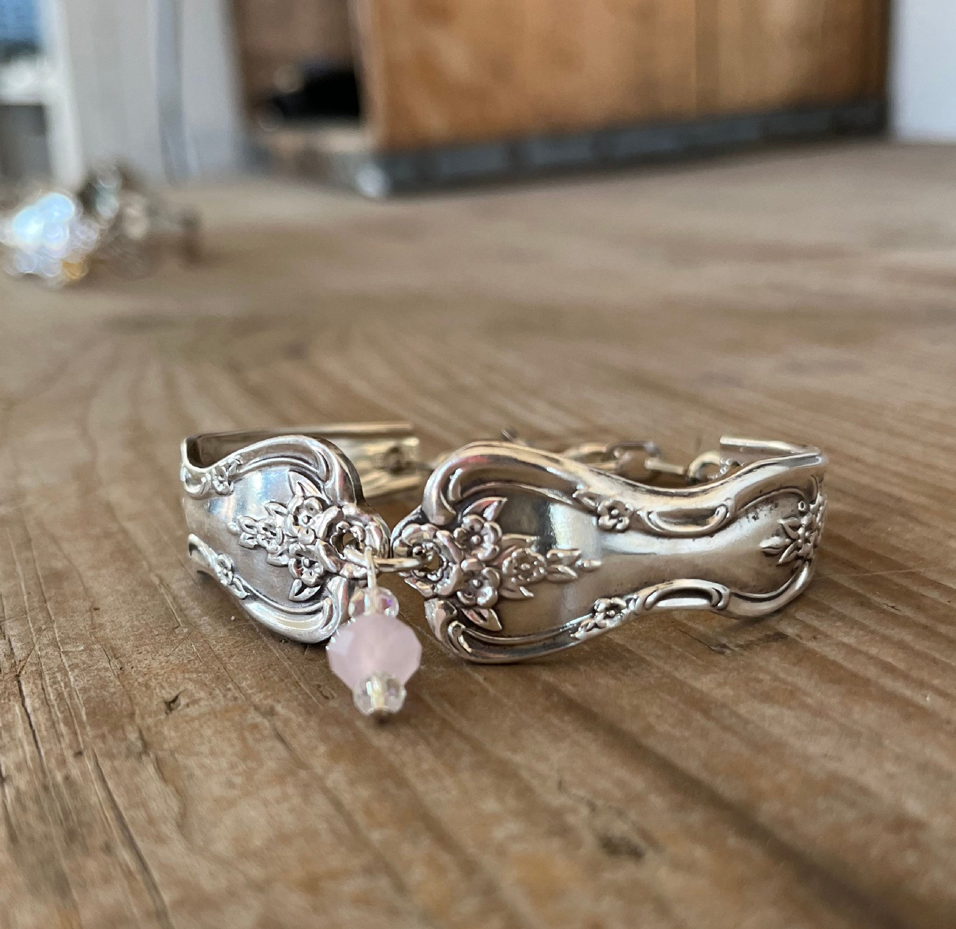 Detailed head on view of handmade spoon bracelet from vintage spoon handles