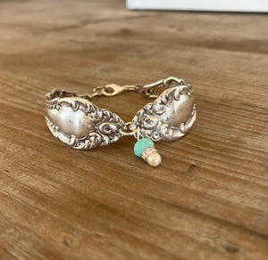 Handmade spoon bracelet from Carlton pattern from 1898 with a jadeite bead