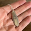 1847 Rogers First Love pattern spoon pendant necklace on chain shown in hand for scale - handcrafted from upcycled vintage silverware - Laughing Frog Studio