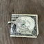 Guitar money clip handcrafted from upcycled vintage silverware spoon 1940 Moderne pattern holding dollar bills