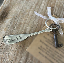 Detailed view of Handstamped Key Chain "Santa's Magic Key" with antique skeleton key and cute holiday tradition poem card.