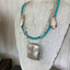 Hand beaded turquoise colored beads paired with vintage silverware and antique belt buckle