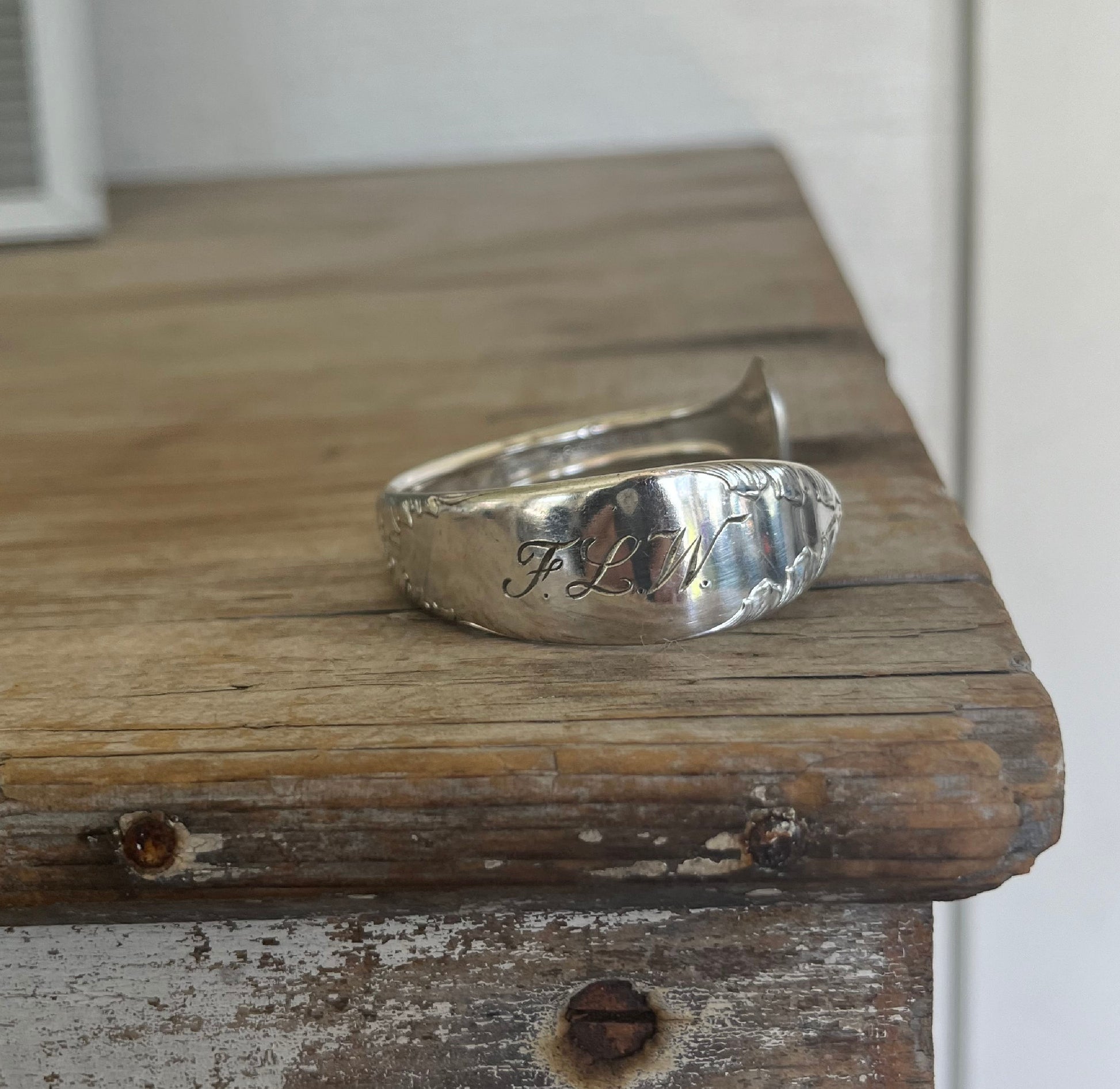 FLW initial monogram stamped spoon cuff bracelet side angle - handcrafted from upcycled vintage silverware - Laughing Frog Studio