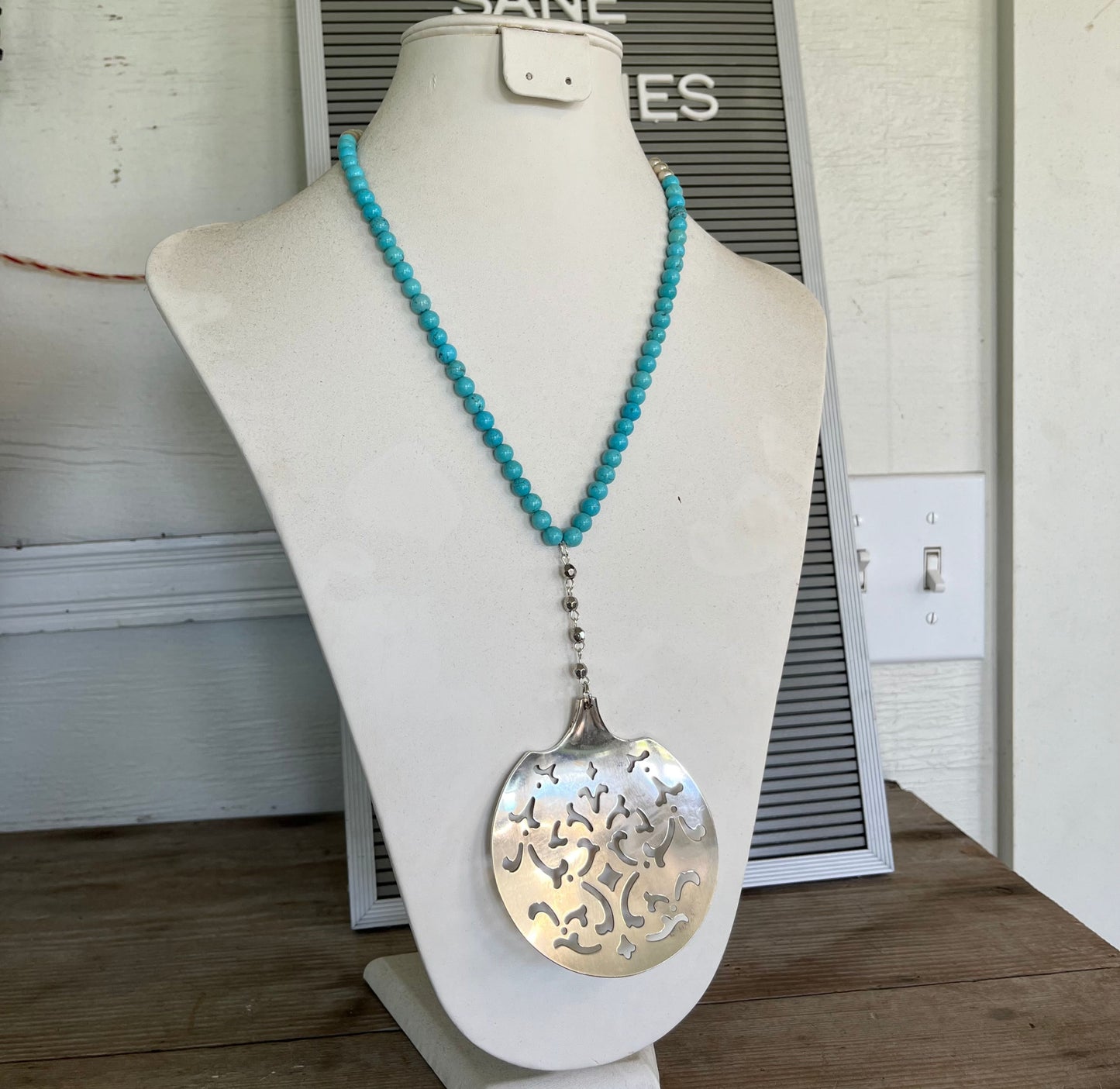 Artisan lariat necklace featuring upcycled tomato server and turquoise magnesite beads - unique statement 
jewelry
