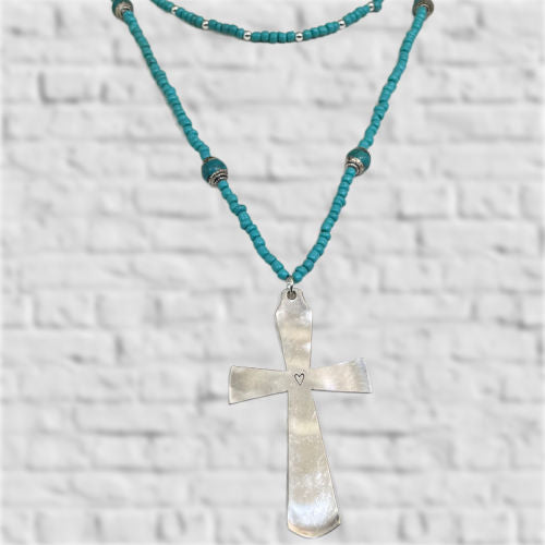 Handcrafted cross pendant on long turquoise and Nepali bead necklace - statement jewelry made from upcycled vintage silverware