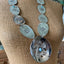 Close up of Product photo of Handcrafted concho necklace from vintage spoon with beetle motif