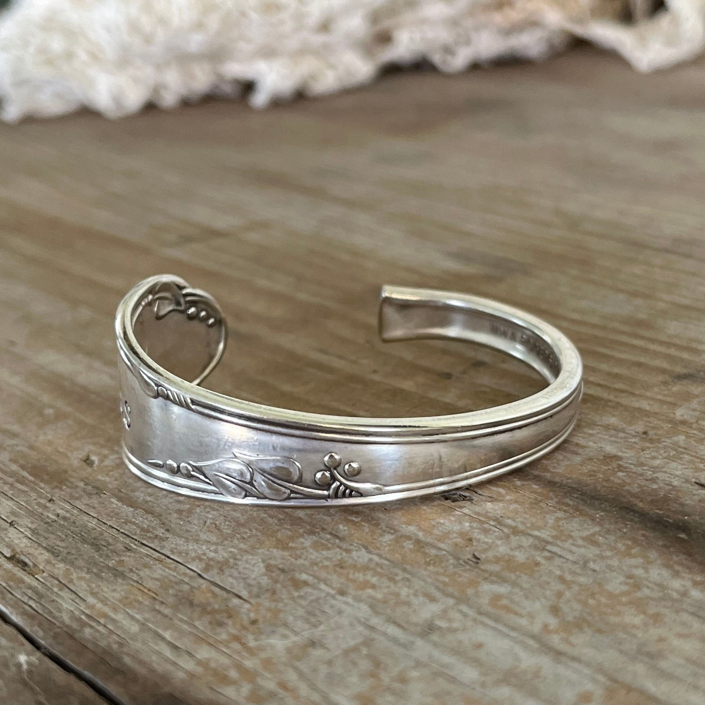 Back view of BADeSS stamped spoon cuff bracelet - handcrafted from upcycled vintage silverware - Laughing Frog Studio